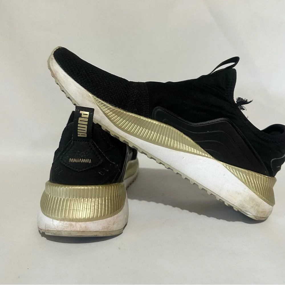 Puma Women’s Black and Gold Athletic Shoes